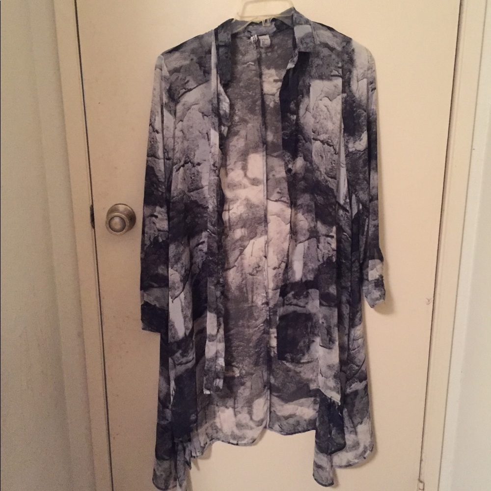 A beautiful light colored mesh cover up! :)